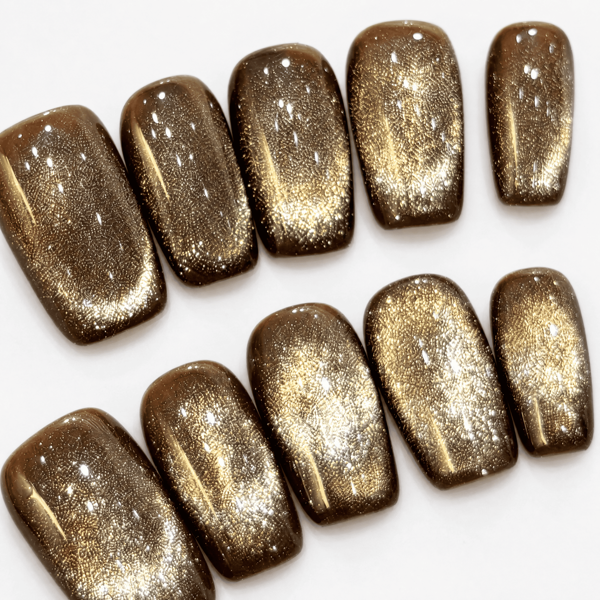 Gold cat-eye short-square press-on nails with chocolate-brown edges