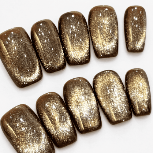 Gold cat-eye short-square press-on nails with chocolate-brown edges