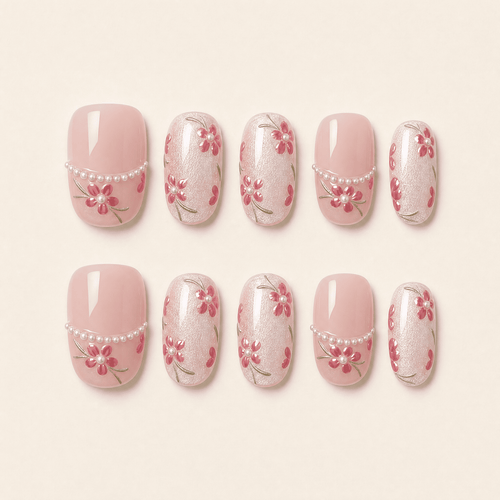 Pink floral cat-eye press-on nails with pearl and translucent details