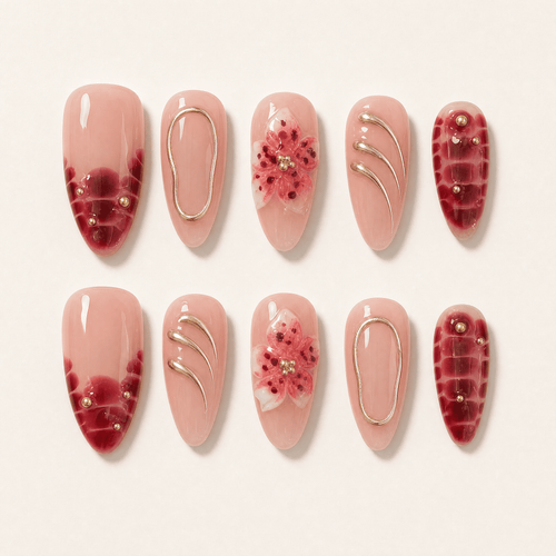 Burgundy floral almond press-on nails worn on one hand