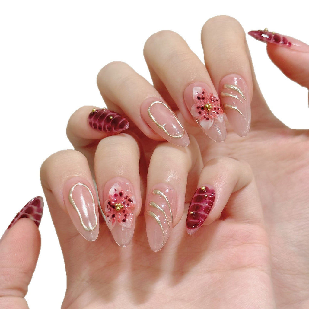 Burgundy floral almond press-on nails worn on one handburgundy-bloom-almond-press-on-nails-0