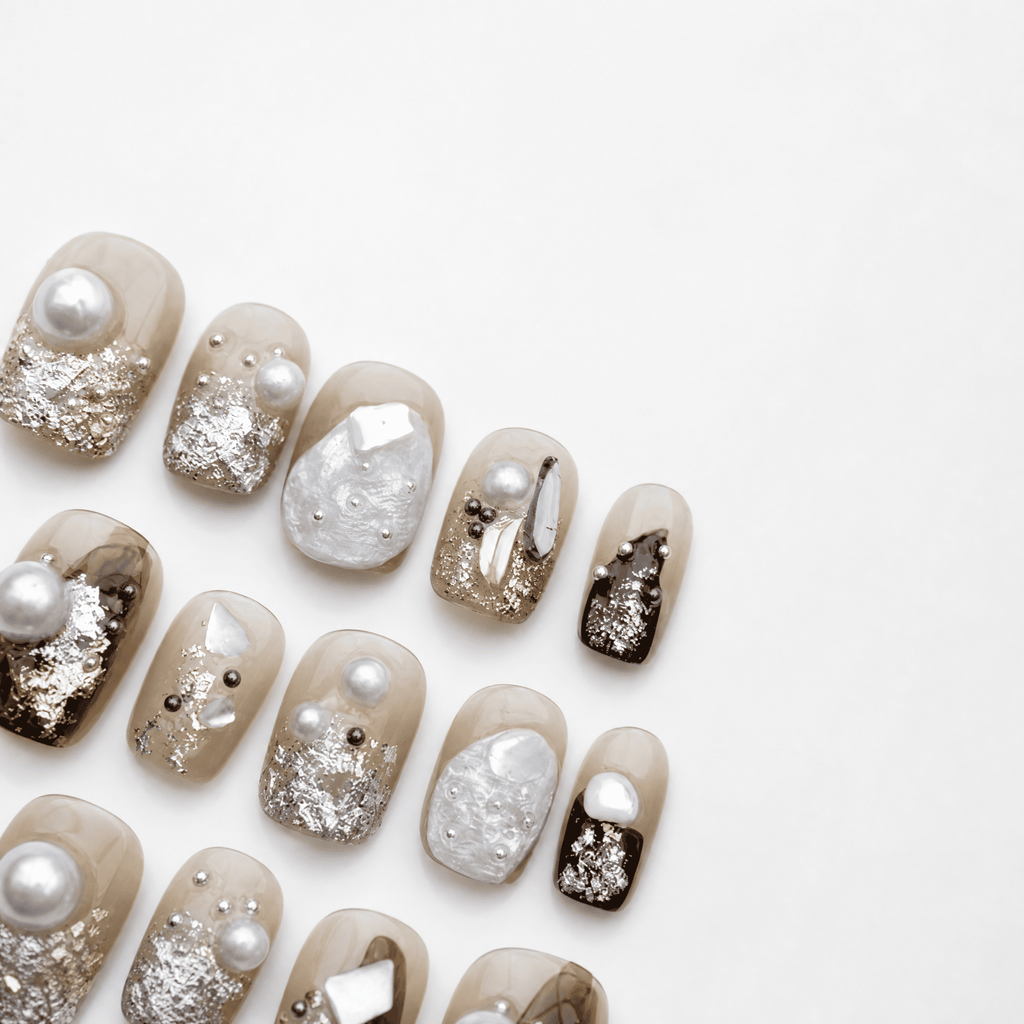 Caramel short-square press-on nails with pearl shell and metallic accents