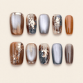 Caramel and smoky-grey cat-eye marble press-on nails with gold foil