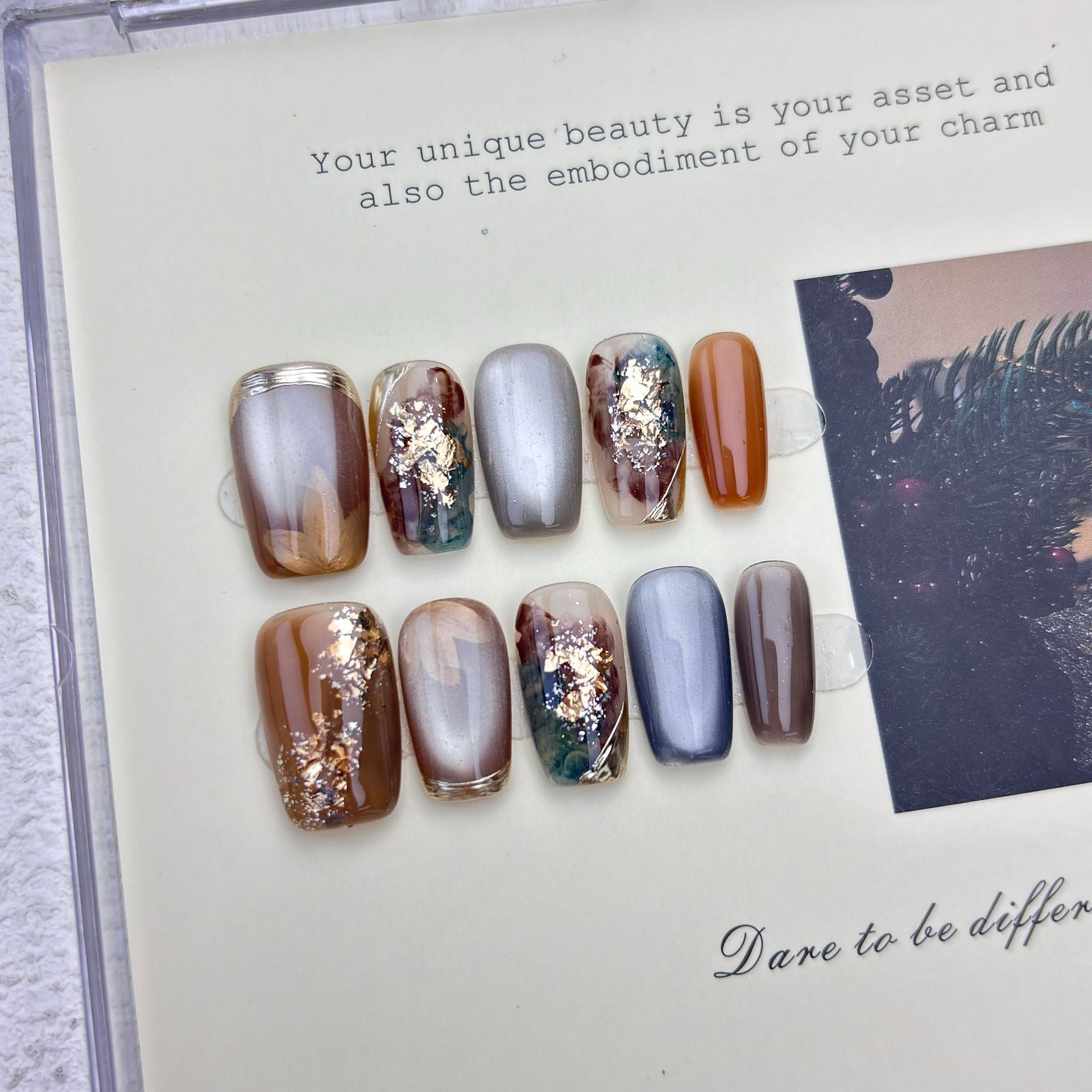 Caramel and smoky-grey cat-eye marble press-on nails with gold foil