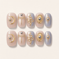 Celestial Baroque press-on nails with gold moon and serpent details
