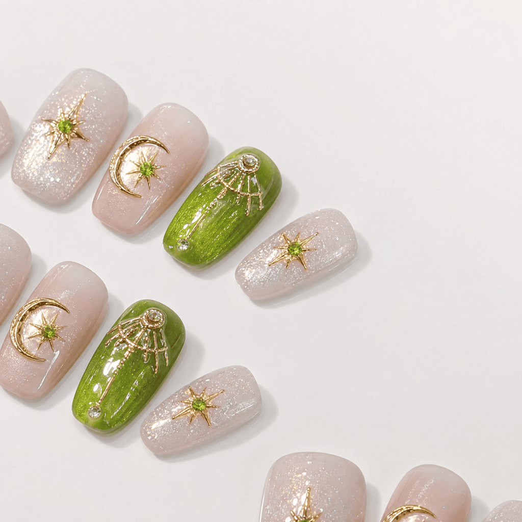 Green and gold short-square press-on nails with celestial designs