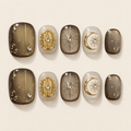Mocha-brown celestial cat-eye press-on nails with gold details