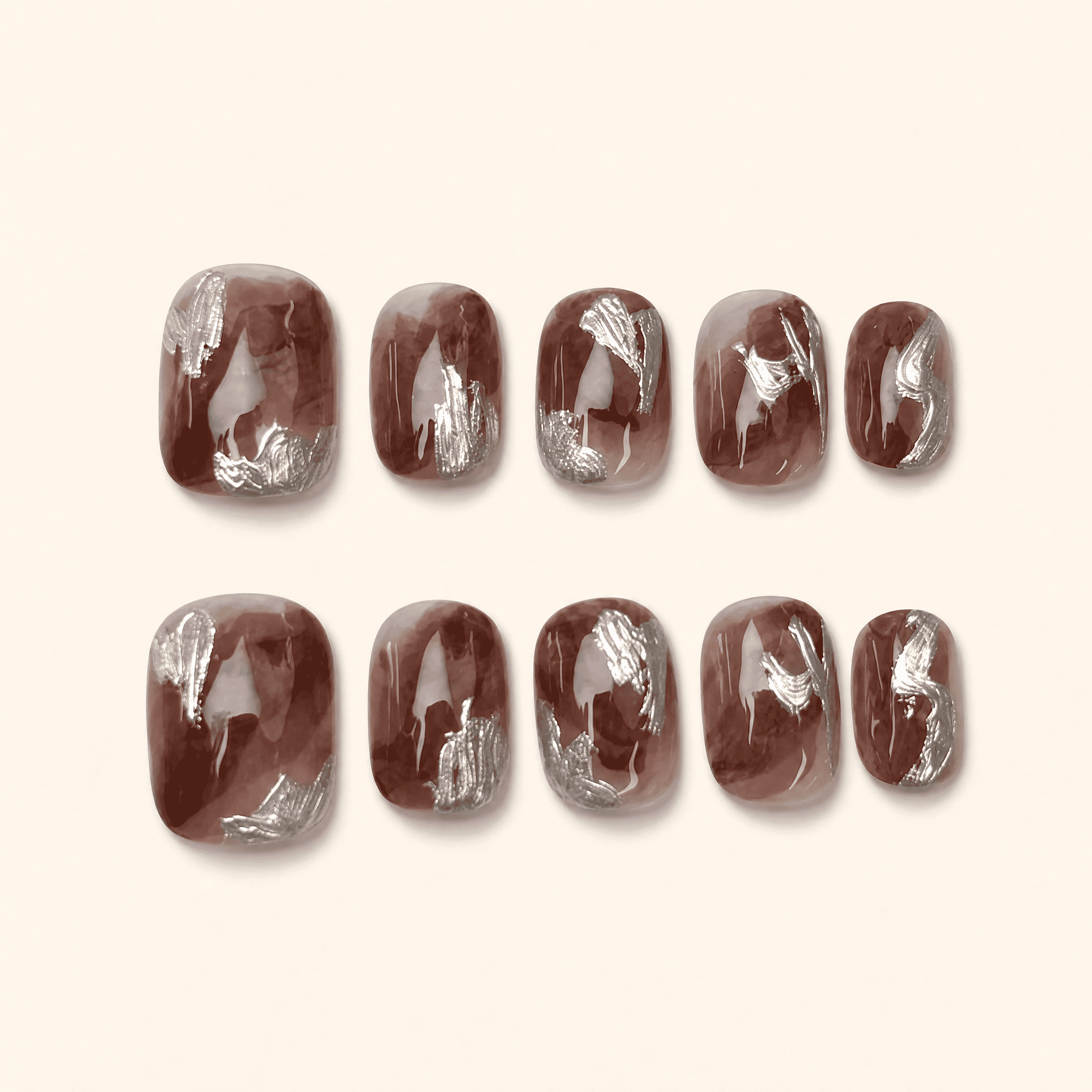 Mocha marble short-squoval press-on nails with silver brushstrokes