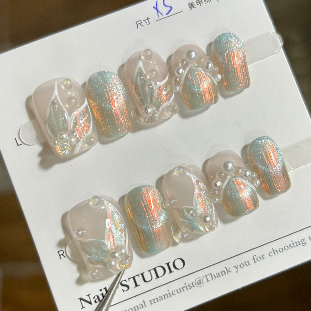 Iridescent blue shell cat-eye press-on nails with pearl accents