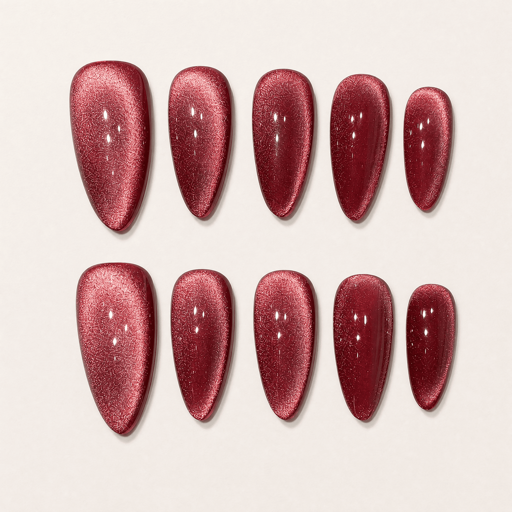 Rose-red cat-eye almond press-on nails with magnetic shimmer